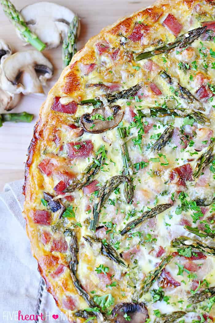 Springtime Asparagus Tart ~ with ham, mushrooms, Swiss, and a buttery crust | FiveHeartHome.com