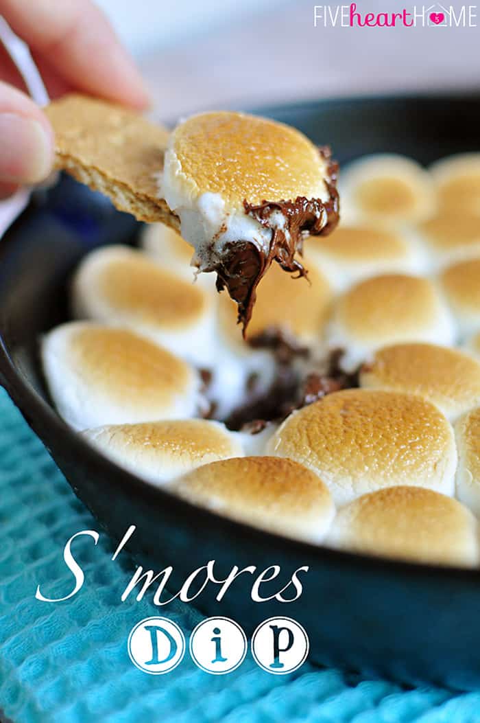S'mores Dip ~ melted chocolate and toasty marshmallows bake up in a skillet; scoop up with graham crackers for a perfect party dessert! | FiveHeartHome.com S'mores Dip with text overlay.