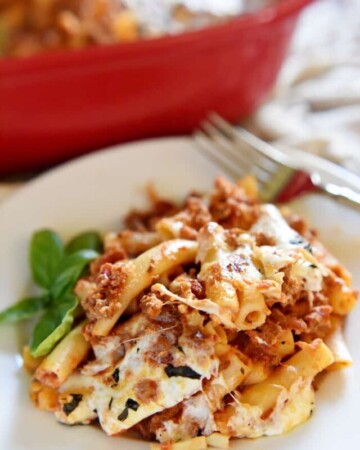 Baked Ziti ~ easy to make and oozing with cheese, this pasta dish is comfort food perfection! | FiveHeartHome.com