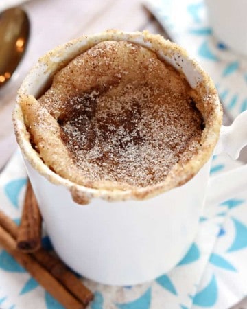 Snickerdoodle Mug Cake ~ bakes up in the microwave in just one minute, yielding a warm, cinnamon-sugary treat that will satisfy any sweet tooth! | FiveHeartHome.com