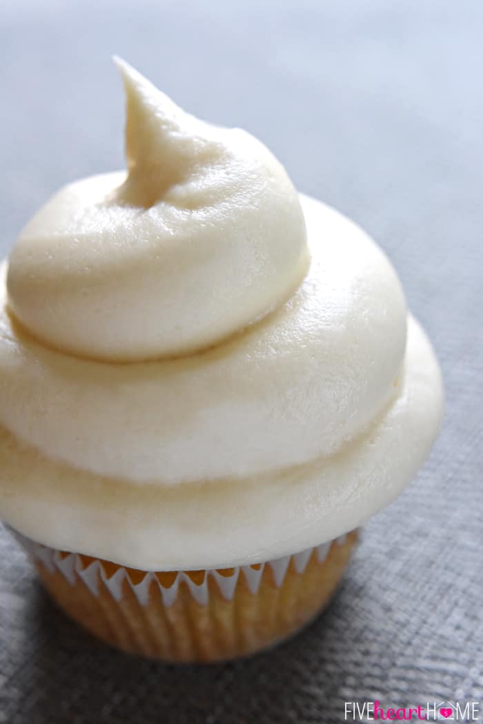 A cupcake topped with a perfect swirl.
