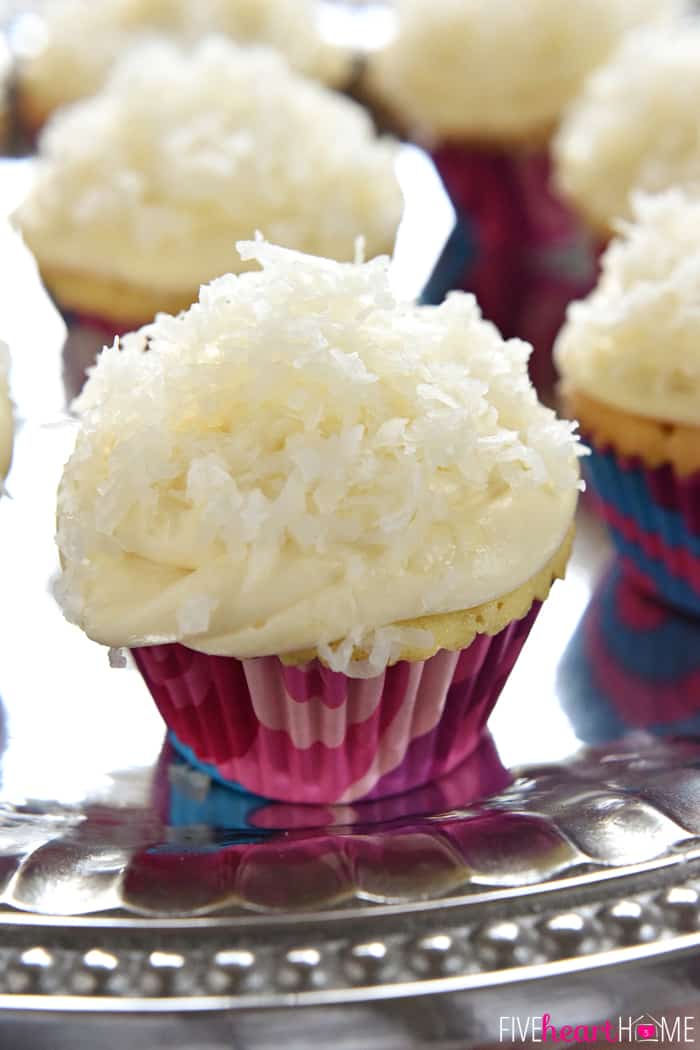 Close-up on platter, topped with cream cheese frosting.