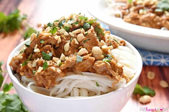 Slow Cooker Thai Chicken with Peanut Sauce ~ features tender chicken stewed in a flavor-infused coconut milk/peanut sauce, served over rice or rice noodles, and garnished with chopped peanuts and cilantro | FiveHeartHome.com
