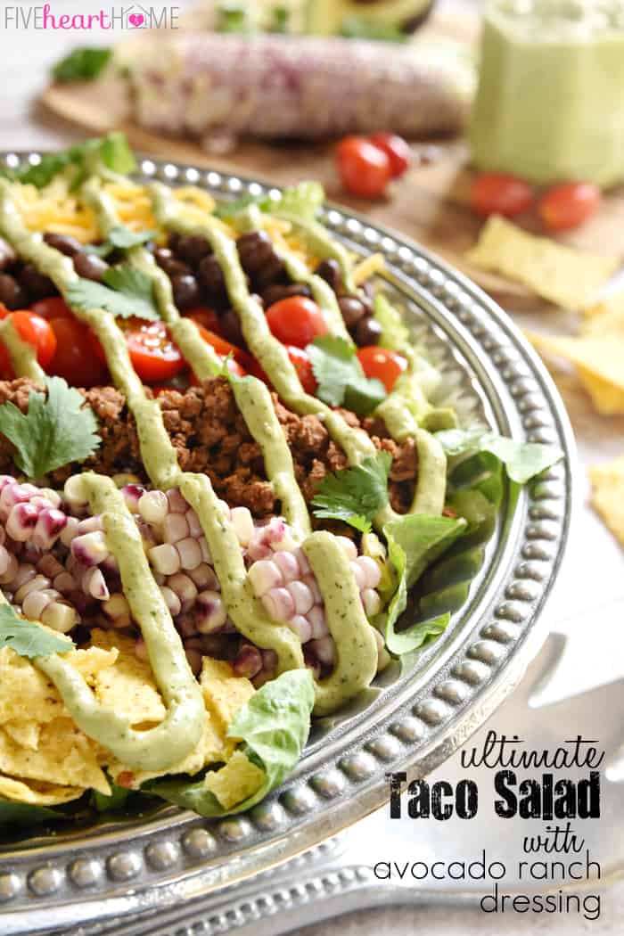 Ultimate Taco Salad ~ an explosion of contrasting flavors and textures, from spicy taco meat and velvety black beans to acidic tomatoes and crisp fresh corn, all topped with crunchy tortilla chips and a creamy, cilantro-flecked Avocado Ranch Dressing! | FiveHeartHome.com