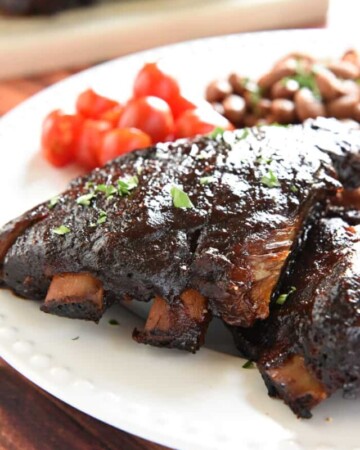 Slow Cooker Baby Back Ribs ~ sticky, smoky, and fall-apart delicious...nobody will ever believe that they came out of the crock pot! | FiveHeartHome.com
