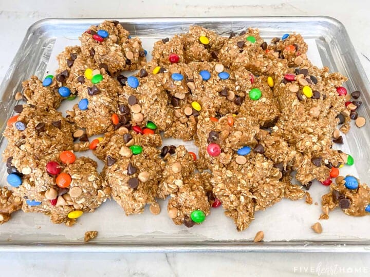 Monster Cookie Bars dough in sheet pan.