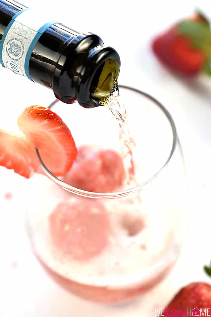 Close-Up of Glass with Alcohol Being Poured Into Glass