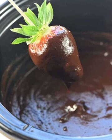 Slow Cooker Chocolate Peanut Butter Fondue ~ a decadent, glossy, chocolate dessert recipe kissed with peanut butter, the perfect crock pot dip for your favorite fruit and confections on Valentine's Day or any day! | FiveHeartHome.com