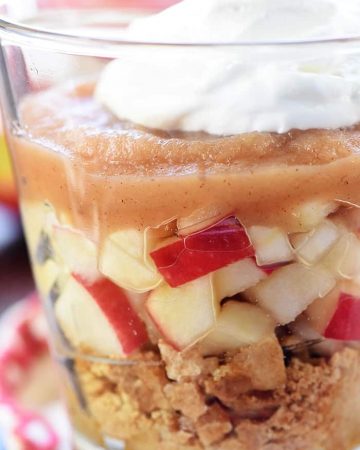 Healthy Apple Pie Snack Cups ~ layers of graham cracker crumbs, diced apples, cinnamon applesauce, and whipped cream make a wholesome after-school snack or dessert that tastes just like apple pie! | FiveHeartHome.com