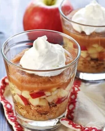 Healthy Apple Pie Snack Cups ~ layers of graham cracker crumbs, diced apples, cinnamon applesauce, and whipped cream make a wholesome after-school snack or dessert that tastes just like apple pie! | FiveHeartHome.com