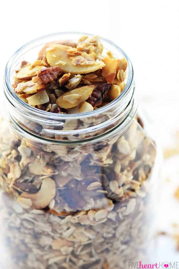 Slow Cooker Granola ~ a combination of oats, nuts, coconut, coconut oil, and honey effortlessly cook in the crock pot for a crunchy, wholesome breakfast or snack! | FiveHeartHome.com