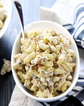 Serving of Tuna Macaroni Salad in bowl with spoon.