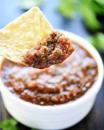Scoop of Canned Tomato Salsa on a tortilla chip.