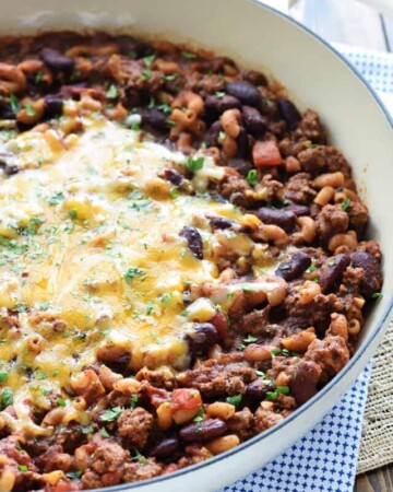 Chili Mac ~ a quick, easy, family-friendly dinner recipe featuring ground beef, beans, pasta, and cheese in a zippy tomato sauce made in just one skillet! | FiveHeartHome.com