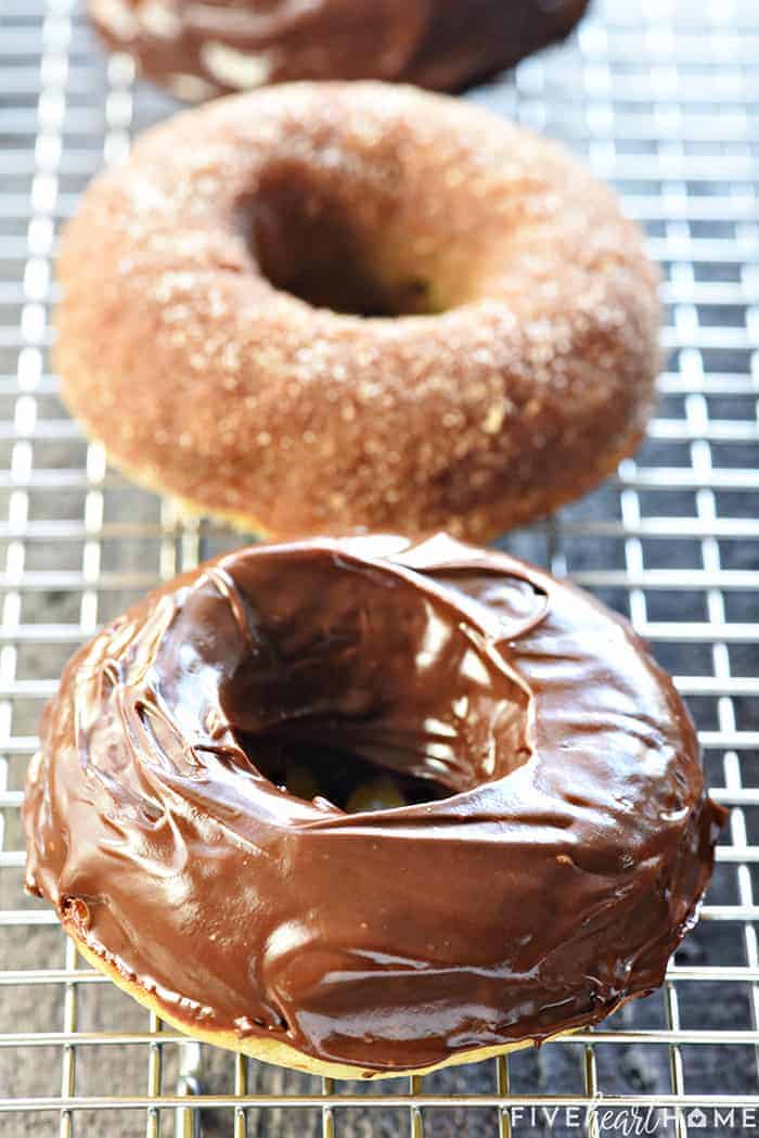 Baked Banana Donuts on a wire cooling rack