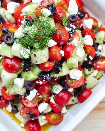 Cucumber Tomato Feta Salad with Olives + Dill ~ a perfect summer side dish recipe for using up an overabundance of garden fresh produce! | FiveHeartHome.com