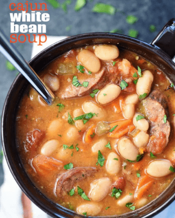 Aerial view of Cajun White Bean Soup with text.
