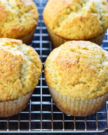 Basic Muffin Recipe showing plain and simple muffin recipe on cooling rack.