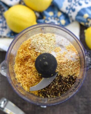 Ingredients in food processor to make Lemon Pepper Seasoning recipe.
