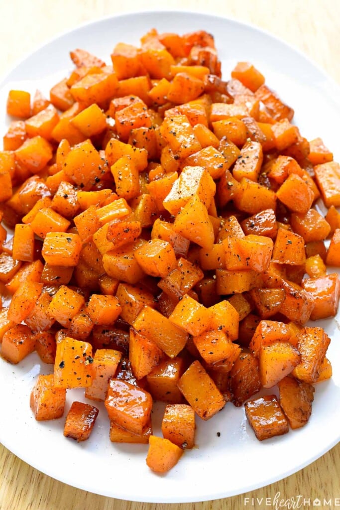 Roasted Butternut Squash recipe on white platter.