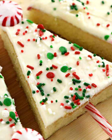 Christmas Sheet Cake with cream cheese frosting decorated as Christmas trees.