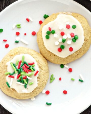 Eggnog Cookies with eggnog glaze and Christmas sprinkles.