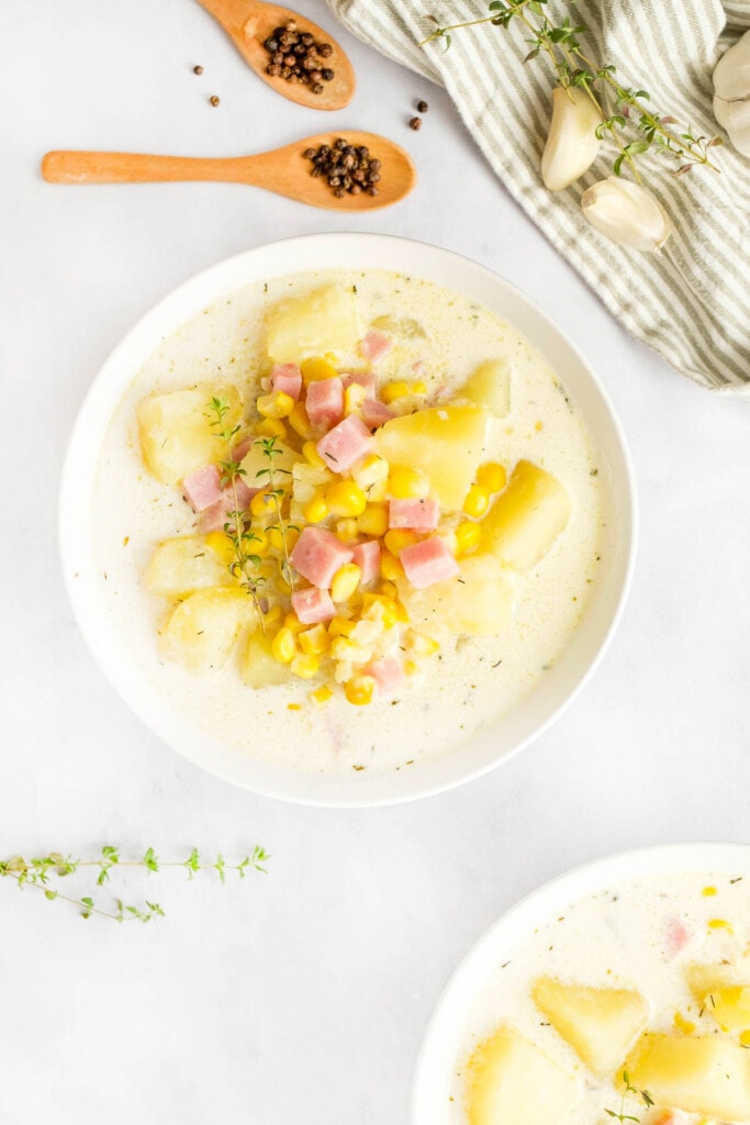 Aerial view of bowls of Potato Corn Chowder.