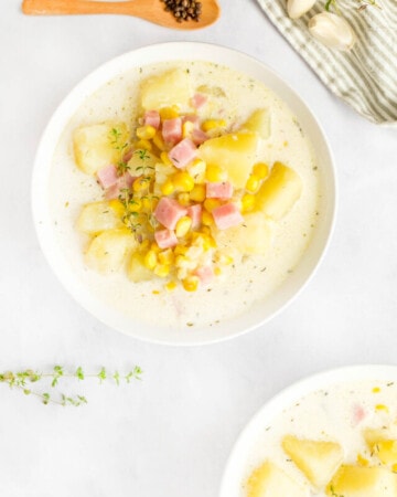 Aerial view of bowls of Potato Corn Chowder.